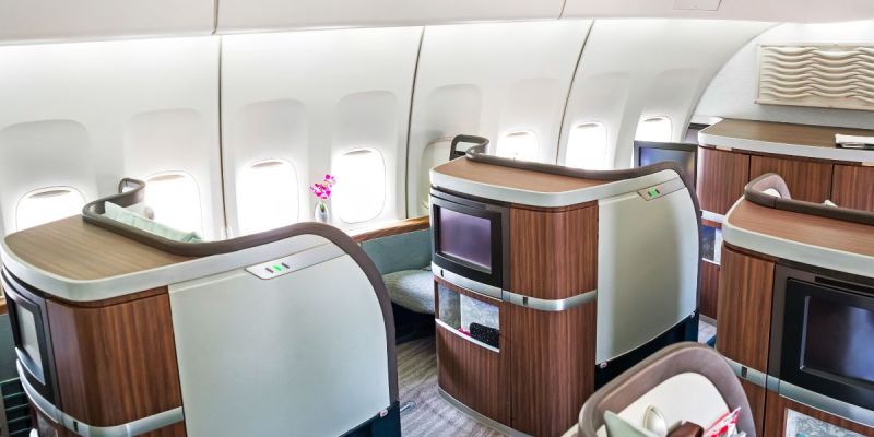 First class airplane seats representing stress-free vegan travel planning