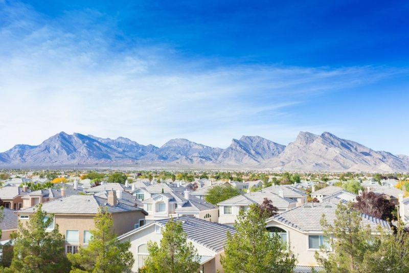 Suburban Las Vegas homes in Summerlin with the Red Rock Canyon mountains in the background.