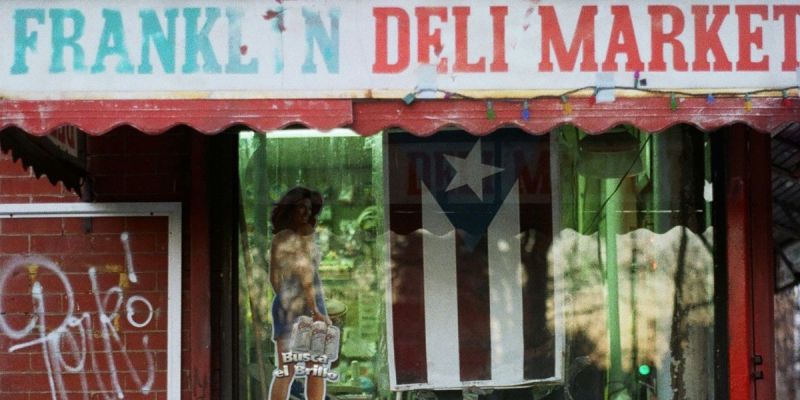 Deli storefront in Greenpoint Brooklyn with neighborhood character and street art