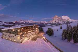 Paradiso Pure.Living vegan hotel exterior on Alpe di Siusi Dolomites.