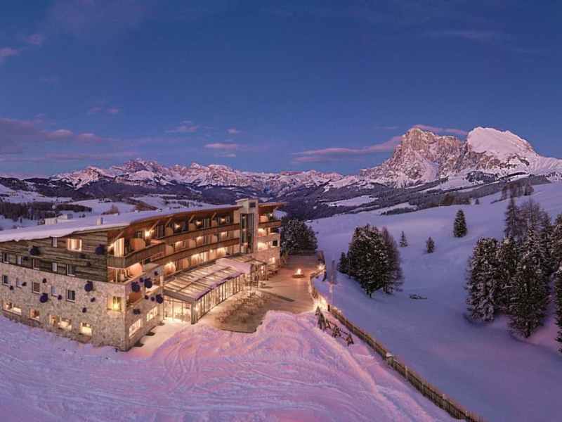 Paradiso Pure.Living vegan hotel exterior on Alpe di Siusi Dolomites.