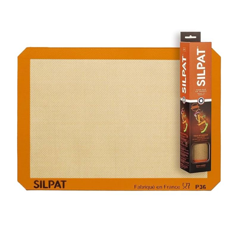 Silpat reusable non-stick baking mat with its packaging beside it
