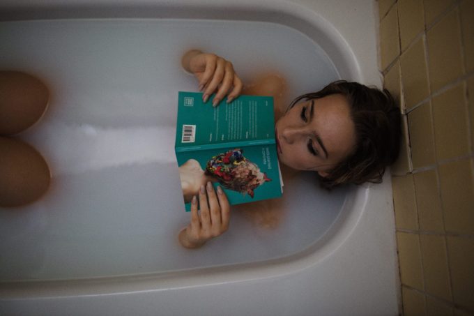 reading in bathtub self care