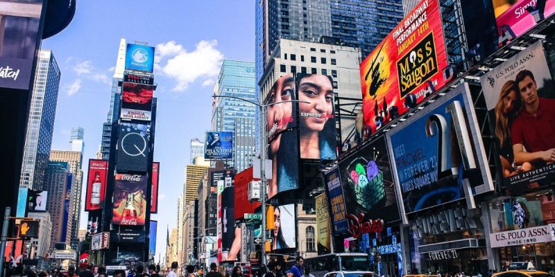 Times Square in New York City with billboards and crowds