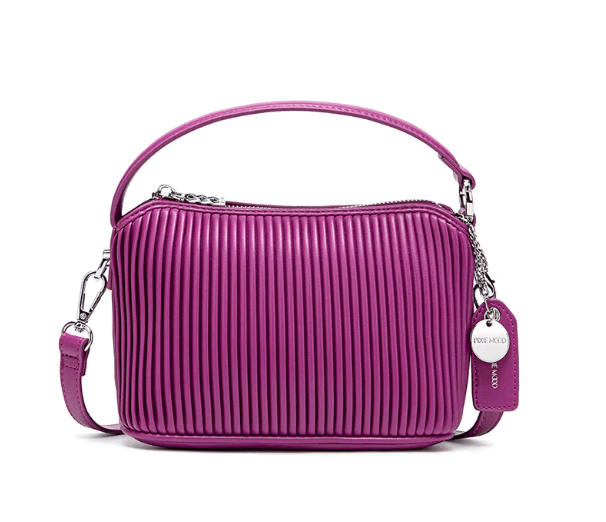 Purple vegan crossbody bag with a ribbed texture, top handle, and detachable strap.